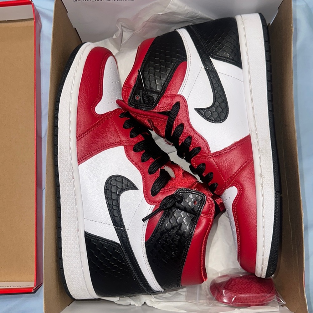 Cute Women’s black and red snake skin Jordan’s